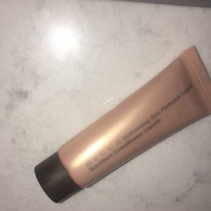 BECCA shimmering skin perfecter in OPAL